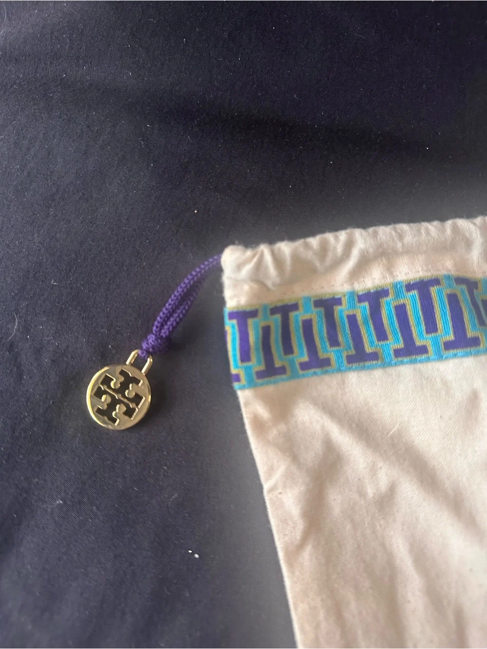 Tory Burch branded white canvas dust bag